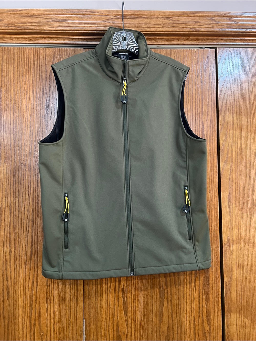 Solaris men’s olive green soft-shell vest.